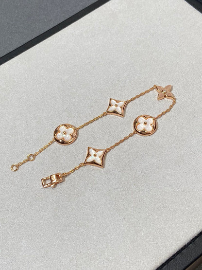 [Everoly JW]STAR AND SUN 5 MOTIF MOP PINK GOLD BRACELET
